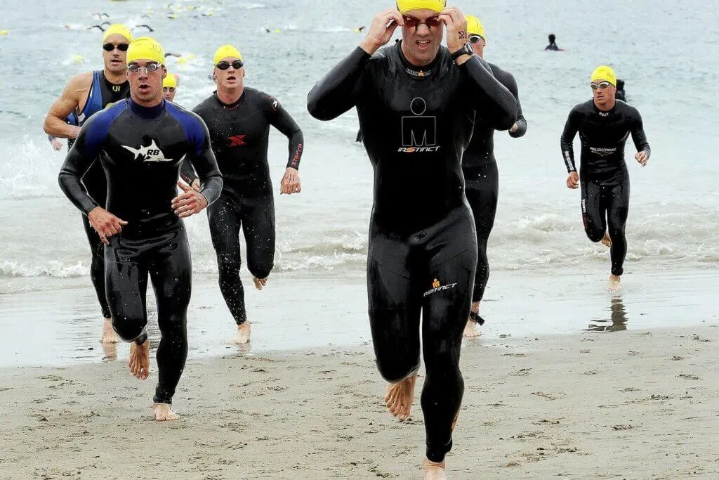 Triathletes finishing the swimming section of a event