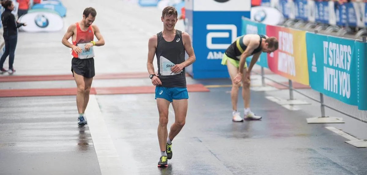 Matt Sharp smiling after finishing a race