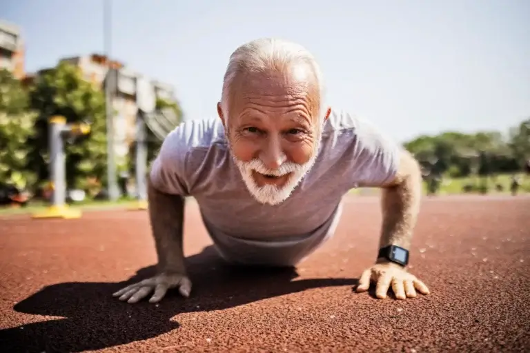 Elderly man doing push ups