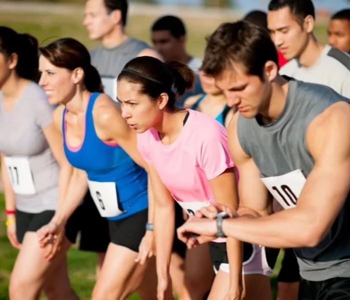 Participants in a race getting ready at the starting line